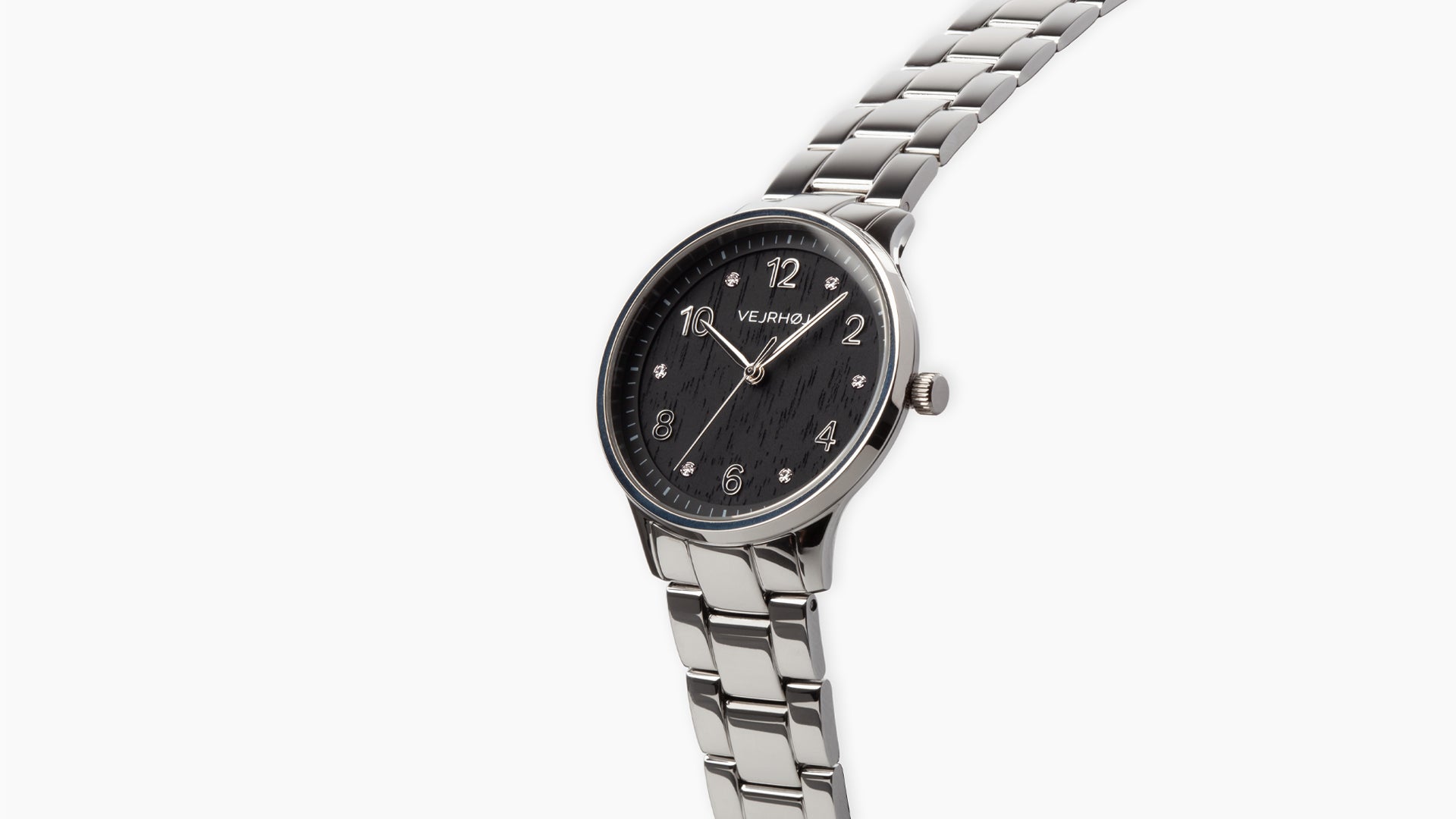 VEJRHØJ Petite Royal Black、木製ダイヤルに輝きを添えるストーンインデックスとシルバーブレスの組み合わせが印象的な腕時計