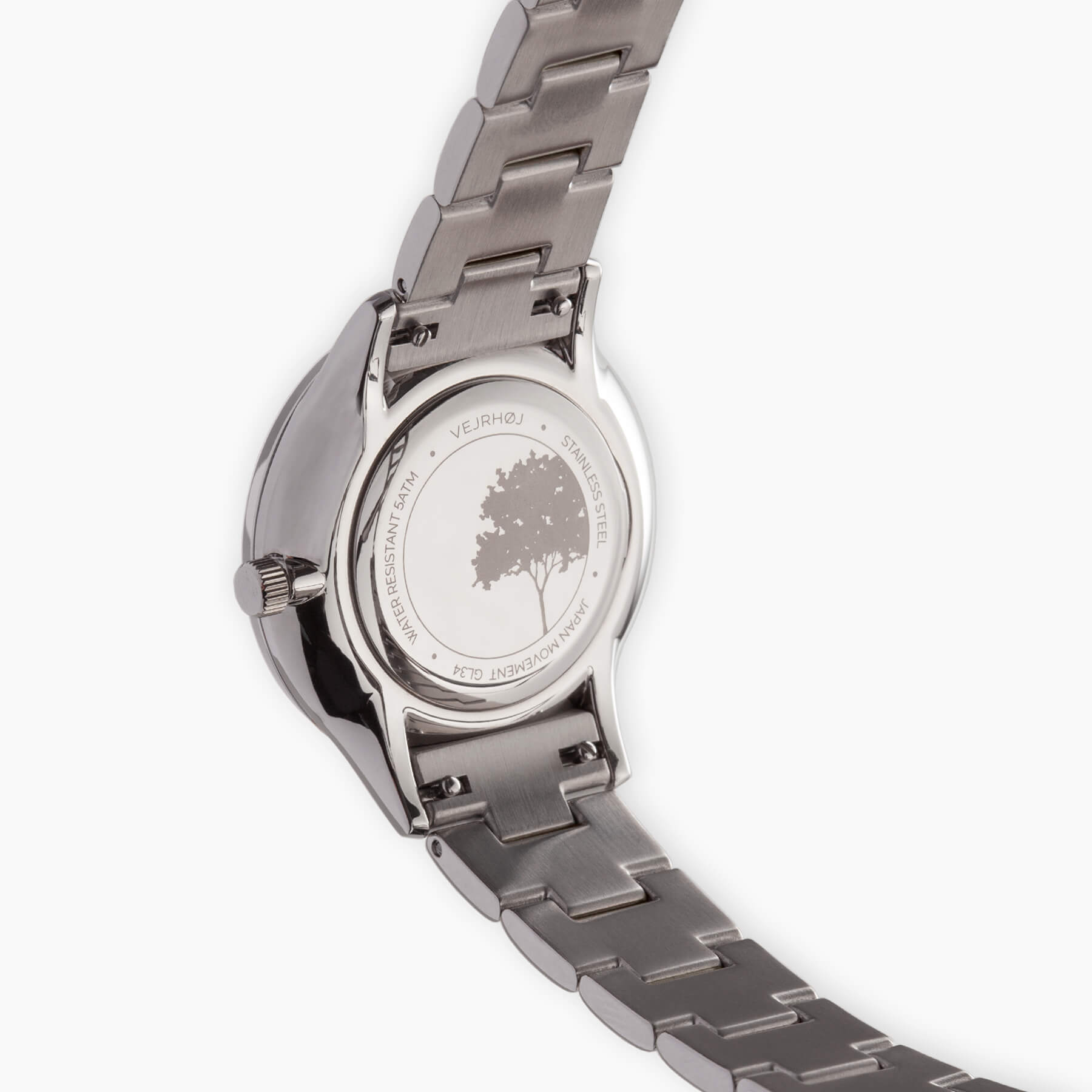 VEJRHØJ Petite Royal Black、ジャパンムーブメントと5ATM防水を示す裏蓋の刻印とメタルブレスレットの接合部